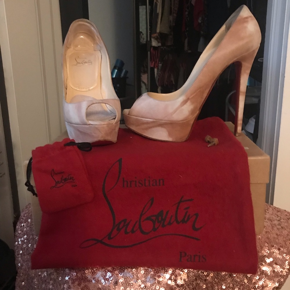Authentic Christian Louboutin peep toe pump